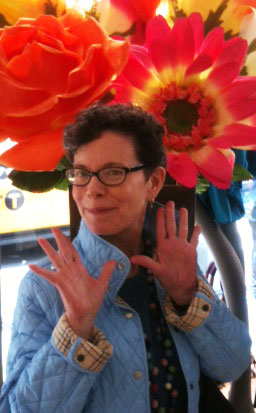 STAFF Wendy Claire Barie with flowers
